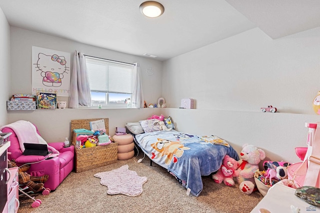 carpeted bedroom featuring visible vents