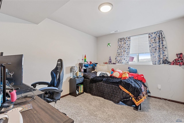 carpeted bedroom with visible vents and baseboards