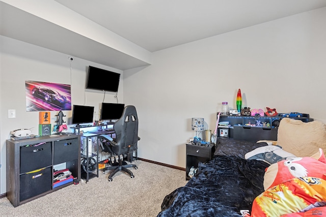 bedroom with carpet flooring and baseboards