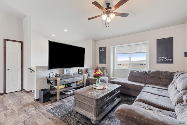 living area with recessed lighting, baseboards, a ceiling fan, and wood finished floors