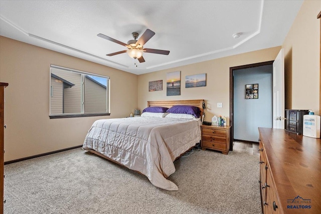 2678 Meadows Dr, Sturgis, SD 57785 - bedroom featuring light colored carpet, baseboards, and a ceiling fan