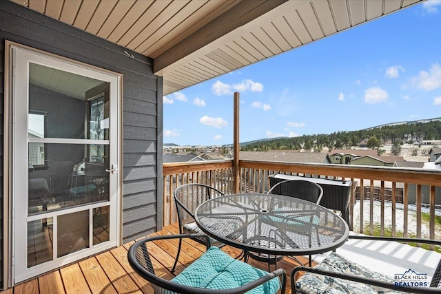 2678 Meadows Dr, Sturgis, SD 57785 - wooden deck featuring outdoor dining area