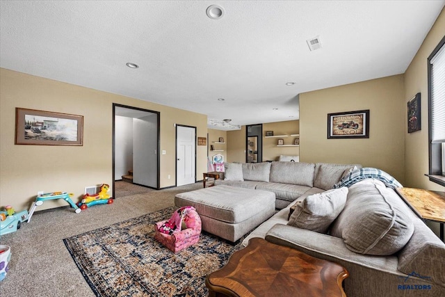 2678 Meadows Dr, Sturgis, SD 57785 - living room with a textured ceiling, carpet, and visible vents