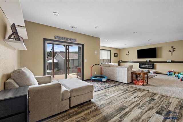 2678 Meadows Dr, Sturgis, SD 57785 - living area with recessed lighting, visible vents, and wood finished floors