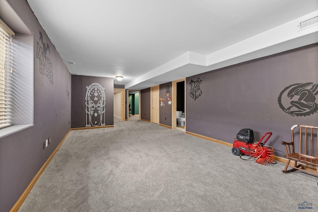 game room featuring carpet flooring, visible vents, and baseboards