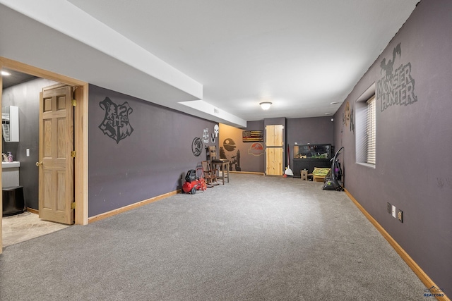 game room with carpet flooring and baseboards