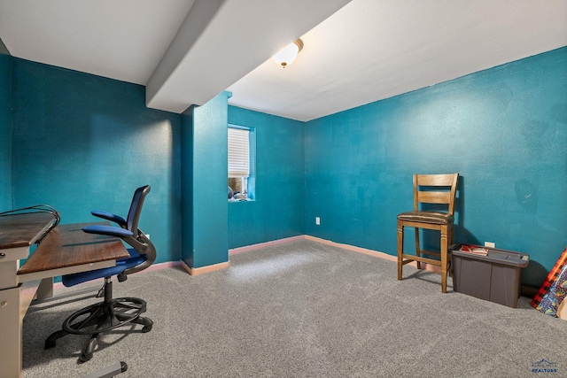 carpeted office with baseboards