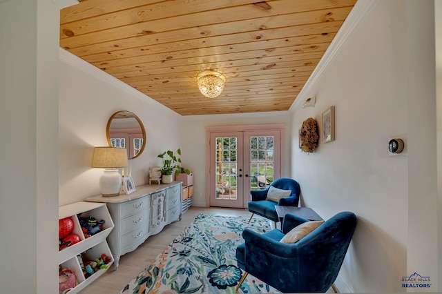 3112 Flint Dr, Rapid City, SD 57702 - living area featuring crown molding, french doors, light wood-type flooring, and wooden ceiling