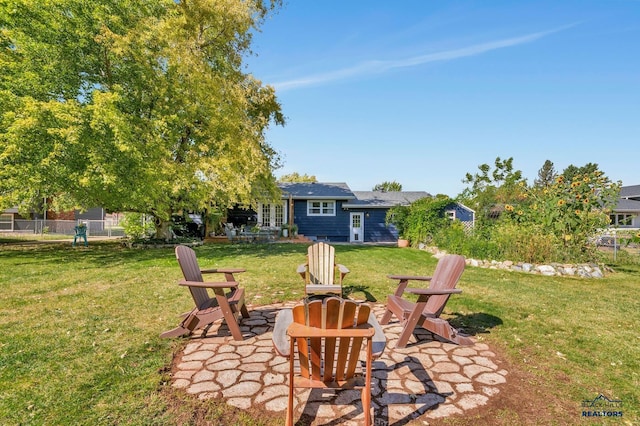 3112 Flint Dr, Rapid City, SD 57702 - view of yard featuring a patio area, fence, and a fire pit