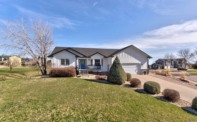 view of front of property featuring concrete driveway, board and batten siding, an attached garage, a front lawn, and a shingled roof