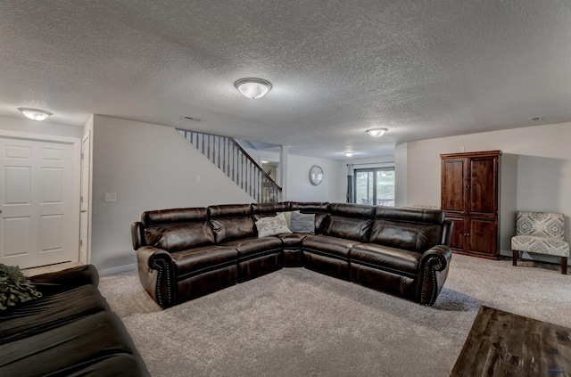 carpeted living room featuring a textured ceiling, baseboards, and stairway