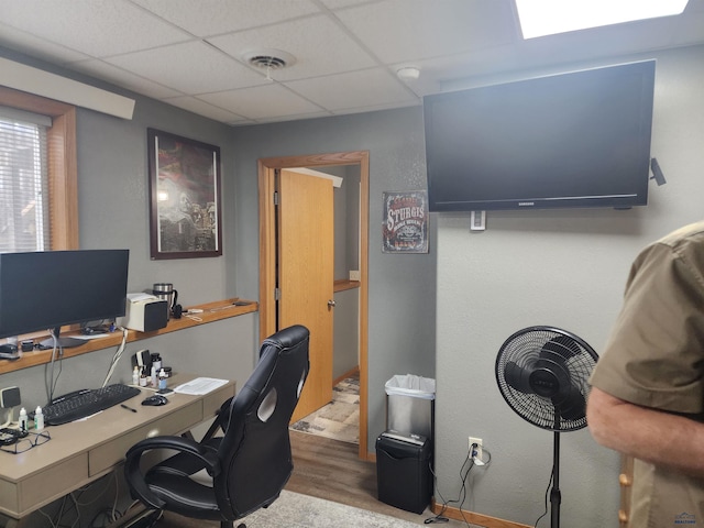 322 Summit, Belle Fourche, SD 57717 - office space with wood finished floors, a drop ceiling, and visible vents
