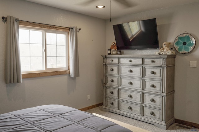 2412 Cameron Dr, Rapid City, SD 57702 - bedroom with light colored carpet, baseboards, and a ceiling fan