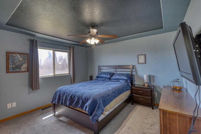 2906 Benjamin, Rapid City, SD 57703 - bedroom with ceiling fan, a textured ceiling, light colored carpet, visible vents, and baseboards