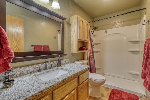 2906 Benjamin, Rapid City, SD 57703 - full bath with a textured wall, toilet, vanity, and a shower with curtain