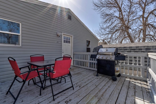 1021 Haines Ave, Rapid City, SD 57701 - wooden terrace with grilling area and outdoor dining space
