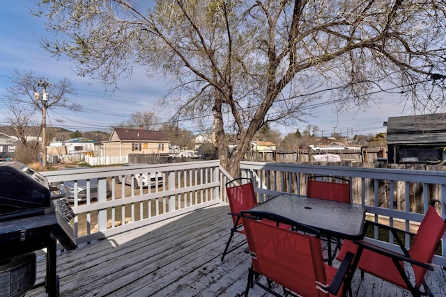 1021 Haines Ave, Rapid City, SD 57701 - deck featuring a residential view, outdoor dining area, and fence
