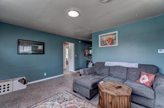 1021 Haines Ave, Rapid City, SD 57701 - living area featuring baseboards, visible vents, and carpet floors