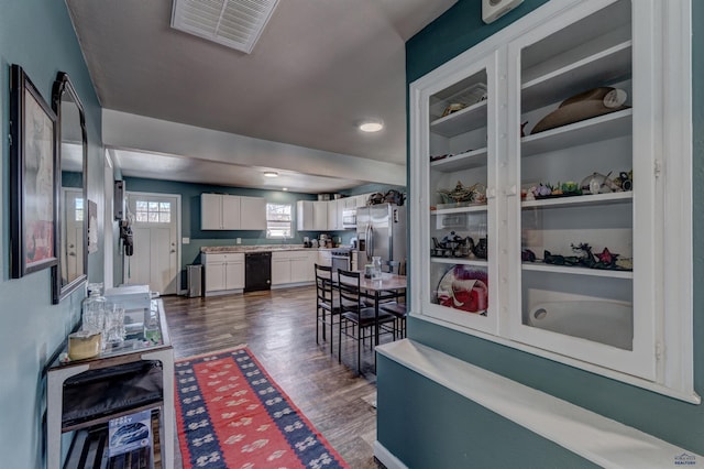 1021 Haines Ave, Rapid City, SD 57701 - interior space with dark wood-type flooring and visible vents