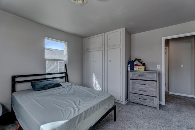 1021 Haines Ave, Rapid City, SD 57701 - bedroom featuring light carpet, visible vents, and baseboards