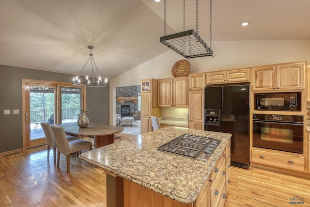8000 Meadow View Ct, Rapid City, SD 57702 - kitchen featuring black appliances, vaulted ceiling, light brown cabinets, and light wood finished floors