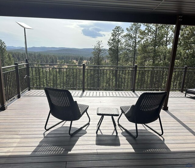 8000 Meadow View Ct, Rapid City, SD 57702 - wooden terrace with a mountain view