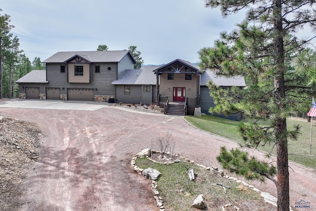 8000 Meadow View Ct, Rapid City, SD 57702 - craftsman-style home with an attached garage and driveway