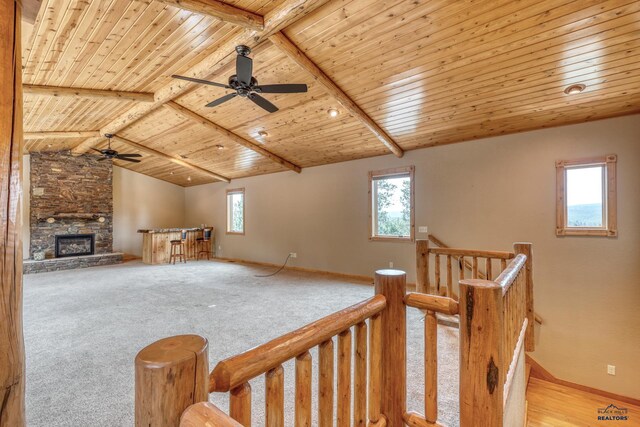 8000 Meadow View Ct, Rapid City, SD 57702 - additional living space featuring ceiling fan, vaulted ceiling with beams, wooden ceiling, and carpet