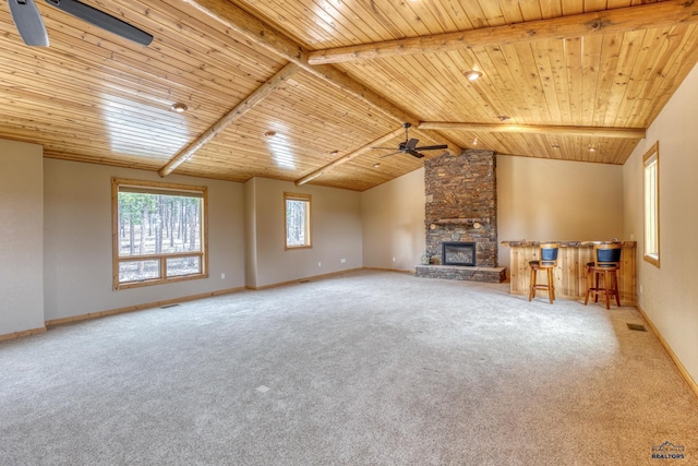 8000 Meadow View Ct, Rapid City, SD 57702 - unfurnished living room featuring visible vents, lofted ceiling with beams, ceiling fan, wood ceiling, and carpet floors