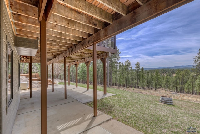 8000 Meadow View Ct, Rapid City, SD 57702 - view of patio with a view of trees