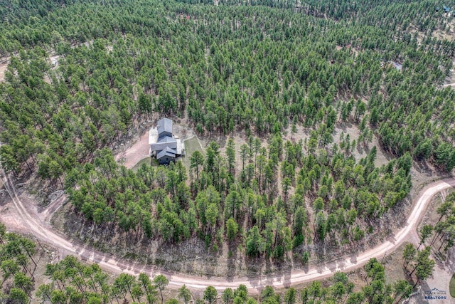 8000 Meadow View Ct, Rapid City, SD 57702 - drone / aerial view with a wooded view
