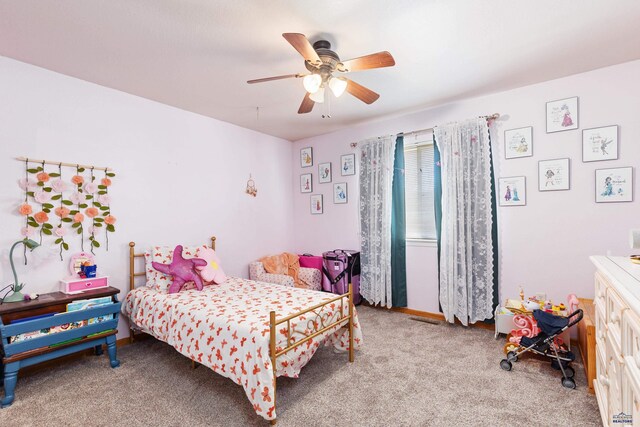 323 Freiheit Ln, Box Elder, SD 57719 - carpeted bedroom featuring ceiling fan