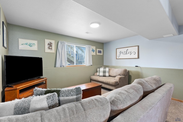323 Freiheit Ln, Box Elder, SD 57719 - carpeted living room featuring visible vents