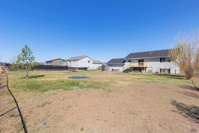 323 Freiheit Ln, Box Elder, SD 57719 - view of yard featuring fence, a residential view, and stairs