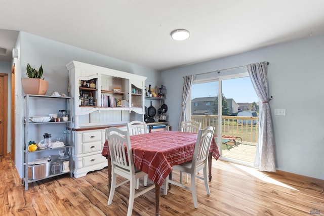 323 Freiheit Ln, Box Elder, SD 57719 - dining area with light wood finished floors