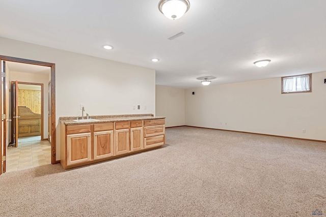 2713 Harney Pl, Rapid City, SD 57702 - interior space featuring visible vents, recessed lighting, light carpet, a sink, and baseboards