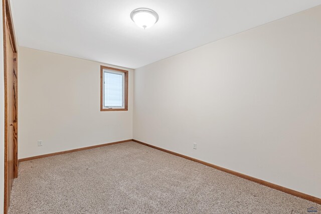2713 Harney Pl, Rapid City, SD 57702 - empty room with baseboards and carpet flooring