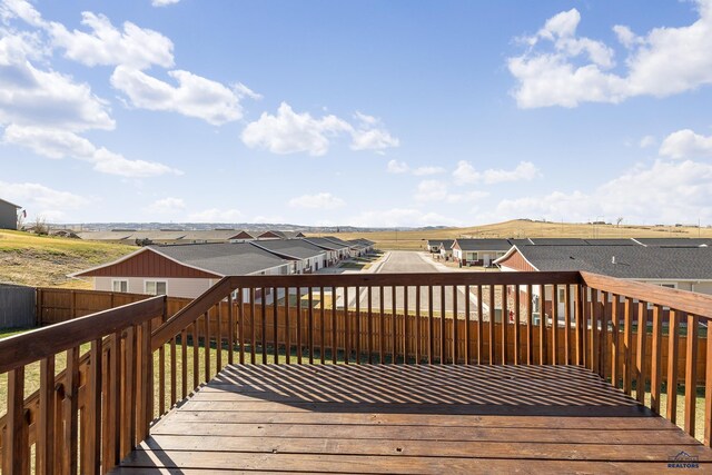 4425 Beringer Dr, Rapid City, SD 57703 - deck featuring a fenced backyard and a residential view