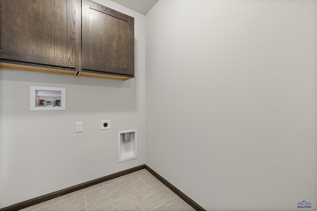 4425 Beringer Dr, Rapid City, SD 57703 - clothes washing area with cabinet space, hookup for a washing machine, baseboards, and electric dryer hookup
