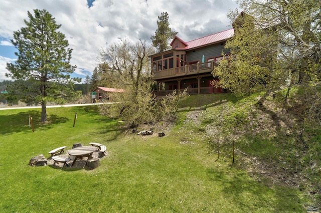 101/109 Sherman St, Rapid City, SD 57702 - view of yard with a wooden deck and a fire pit