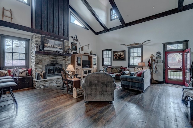 101/109 Sherman St, Rapid City, SD 57702 - living area featuring beamed ceiling, a fireplace, wood finished floors, and high vaulted ceiling
