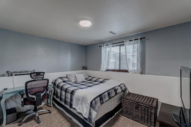bedroom with carpet and visible vents