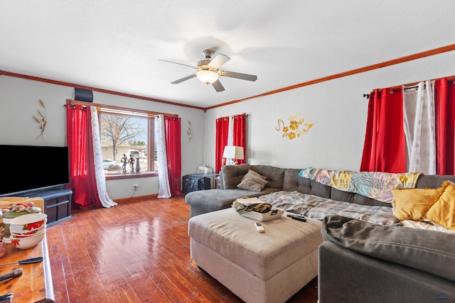 1021 Blaine Ave, Rapid City, SD 57701 - living area with wood finished floors, ornamental molding, baseboards, and ceiling fan