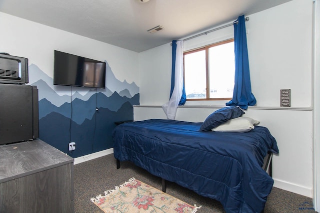 1711 Plateau Ln, Rapid City, SD 57703 - carpeted bedroom featuring baseboards and visible vents