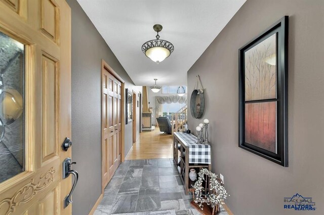 5325 Snowberry Ct, Rapid City, SD 57702 - entryway featuring baseboards