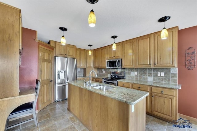 5325 Snowberry Ct, Rapid City, SD 57702 - kitchen with stainless steel appliances, a sink, light stone countertops, baseboards, and tasteful backsplash