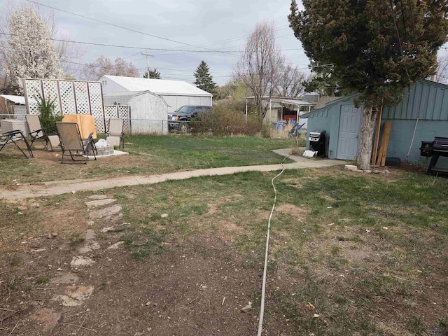 315FRANKLIN Franklin, Rapid City, SD 57701 - view of yard with fence, a shed, and an outdoor structure