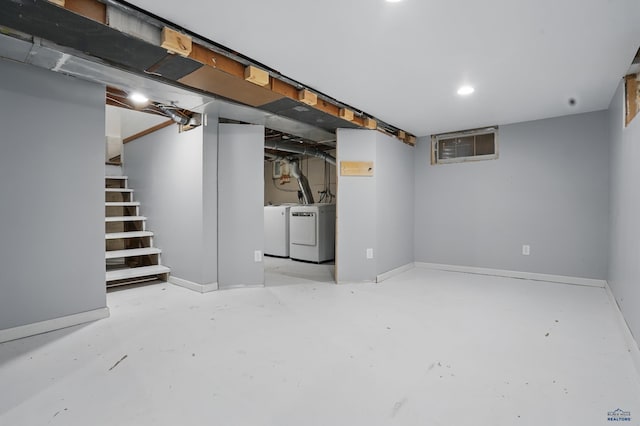 4125 Canyon Lake Dr, Rapid City, SD 57702 - finished below grade area with stairs, baseboards, and washing machine and dryer