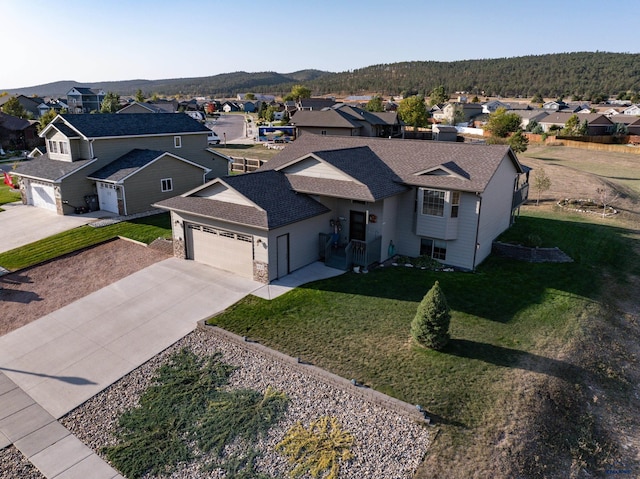 aerial view featuring a residential view and a mountain view