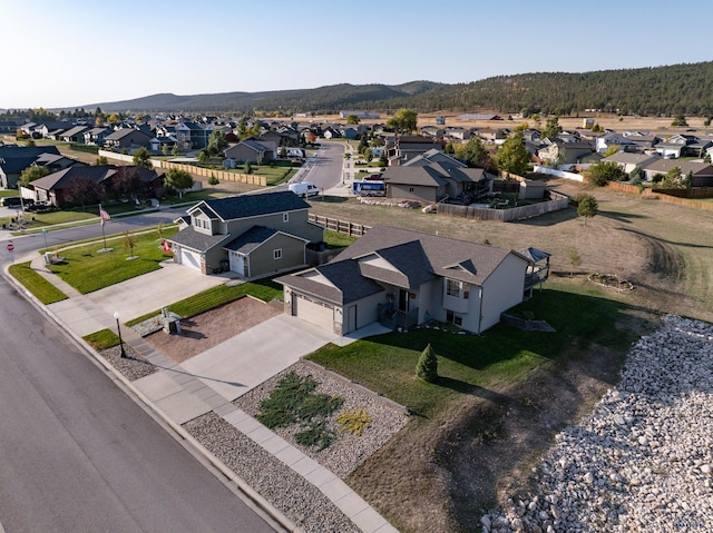 bird's eye view with a mountain view and a residential view